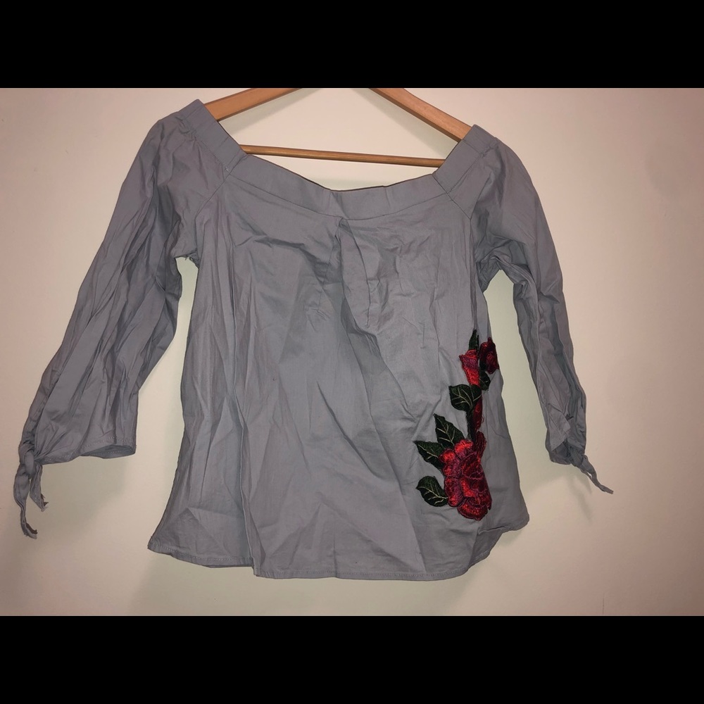 Off the shoulder blue blouse